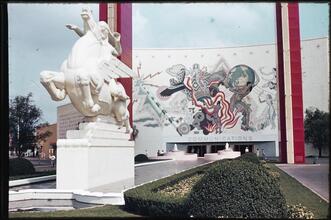 ["Speed" sculpture and the Communications Building.]