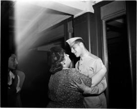 Penn Station [Soldier reuniting with a family member.]
