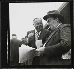 Aqueduct Race Track [Men at a racetrack.]