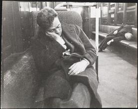 Life and Love on the New York City Subway [Men sleeping on a subway.]
