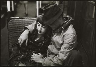 Life and Love on the New York City Subway [Couple on a subway.]