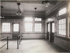 [Interior of an unidentified train station.]