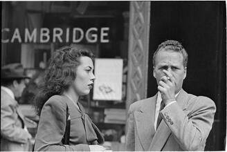 Street Conversations [Man and woman talking on the street.]
