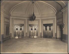 [Interior, elevator lobby.]