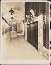 [Elevator lobby.]