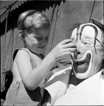Circus [Child with a clown.]