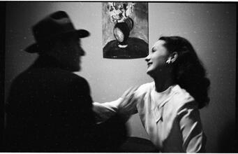 Show Girl [Rosemary talking to a man.]