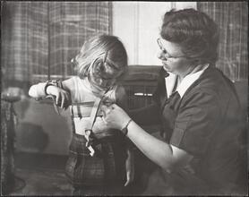 Crippled Children's Society, Testing Prosthetic Arm Brace.