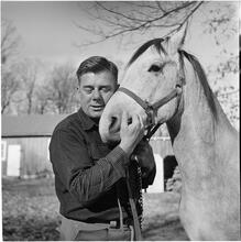 Arthur Godfrey [Godfrey with a horse.]
