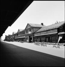 [Delapidated buildings on the Hudson River waterfront.]