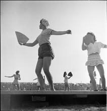 Circus [Circus performers dancing.]