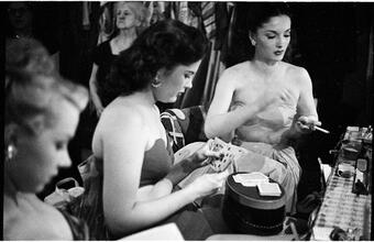 Show Girl [Rosemary Williams playing cards in the dressing room.]