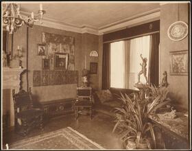 [Residence. Interior, parlor.]