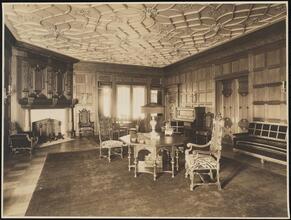 [Residence. Interior, parlor.]