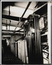 [Interior, film processing.]