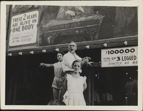 [Sideshow performers on Coney Island midway.]