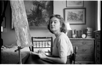 [Felicia Marsh painting in bedroom.]