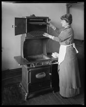 Cleaning gas range.