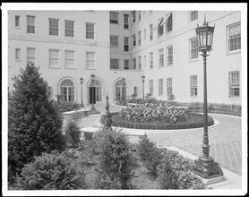 Broadway between 89th and 90th Streets. Astor Court, view of gardens in court.