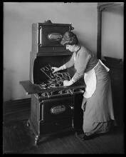 Cleaning gas range.