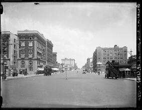 Broadway Series. View of where St. Nicholas Ave. meets Broadway, and subway continues up St. Nicholas Ave. straight north. Subway 168th kiosk at right.