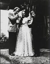 [Stan Porter, unidentified actress, and Bruce Adler in "Hard to Be a Jew".]