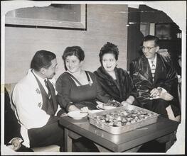 [Gertrude Berg and Berta Gersten with unidentified dining companions.]