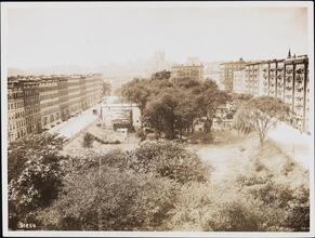 [Watt-Pinkney Mansion's yard surrounded by apartment buildings.]