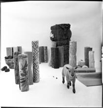Salvador Dali: Rugs [Lamb in a display of rugs and materials that rugs contain.]