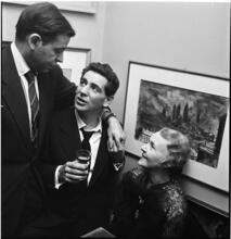 Leonard Bernstein [Party guests talking to Leonard Bernstein.]