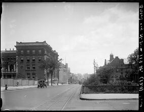 Broadway Series. Looking north from 118th Street. Columbia University buildings at left. Broadway warehouse in distance looking toward at lights, and where subway comes out from below ground.
