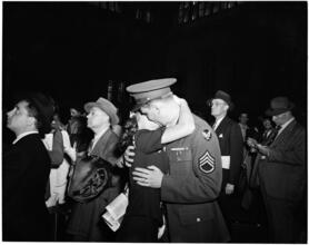 Penn Station [Soldier reuniting with his wife.]