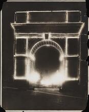 [Washington Square Arch at night.]