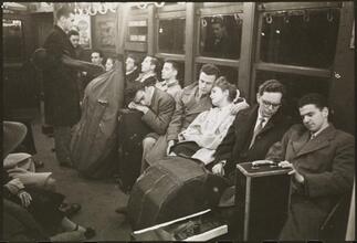 Life and Love on the New York City Subway [Musicians with their instruments on a subway.]