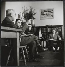 Columbia University [Professor with students in an office.]