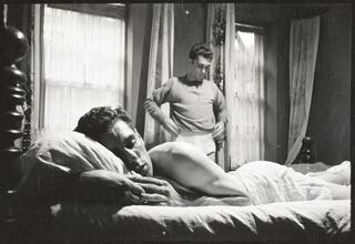 Walter Cartier, Prizefighter of Greenwich Village [Walter Cartier getting dressed as Vincent Cartier remains asleep.]