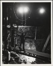 Finish-on-Time (Night view of pile driving)