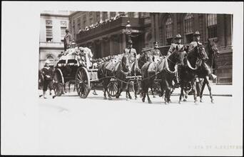 [Firemen marching in a parade.]