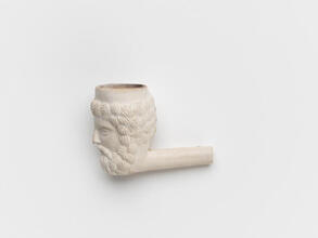 Anthropomorphic clay pipe