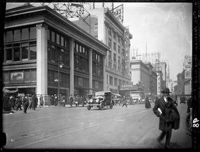 Broadway Series. Looking north from 50th Street, showing west side of Broadway. Overland Car store on corner at left. Capital Theater in center of picture.