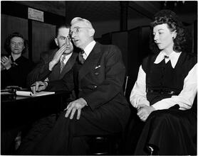 Dale Carnegie [Mrs. Dale Carnegie watches her husband criticize students.]