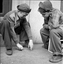 Shoe Shine Boy [Mickey and his friend at a shoe shine stand.]