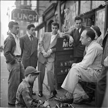 Shoe Shine Boy [Mickey shining shoes.]