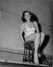 Holm, Eleanor- World's Fair N.Y. Swimming Pool [Eleanor Holm on a stool.]