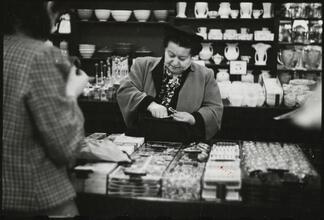The 5 and 10 [Woman shopping at Woolworth's.]