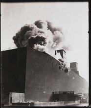[Building on fire.]