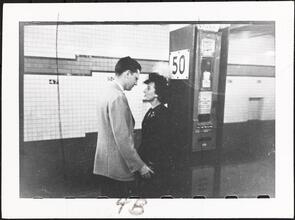 Life and Love on the New York City Subway [Couple on the platform at the Rockefeller Center station.]