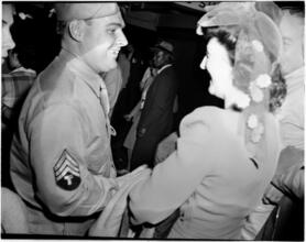 Penn Station [Soldier returning home from World War II.]