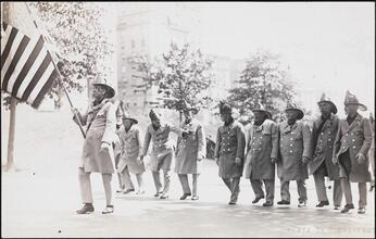 [Firemen in parade.]