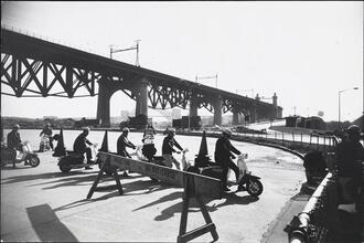 [Motorcycle police.]